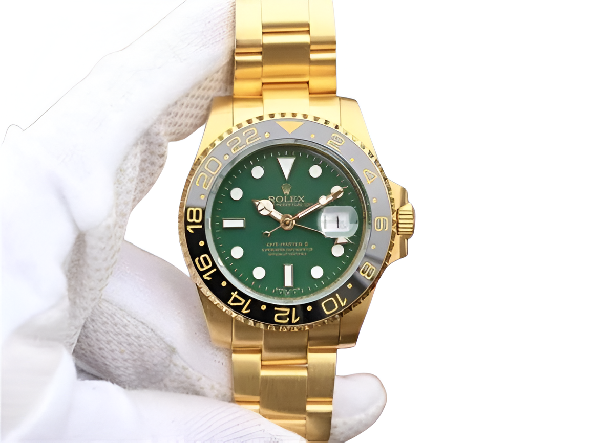 Rolex GMT-Master II 18K Yellow Gold & Green Dial
