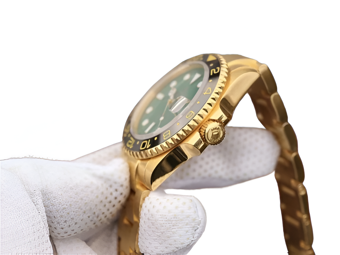 Rolex GMT-Master II 18K Yellow Gold & Green Dial