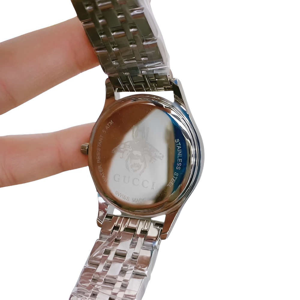 Gucci Women's Silver and Gold Classic Watch