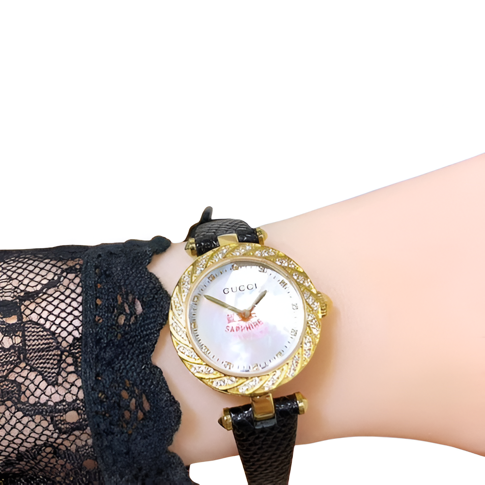 Gucci Women's Gold Sapphire Watch