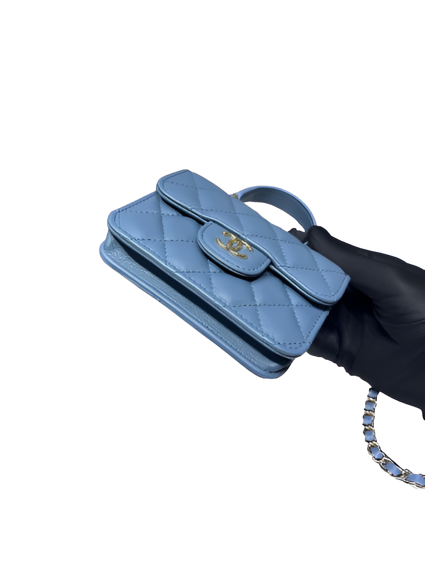 CHANEL Quilted Blue Mini Flap Bag