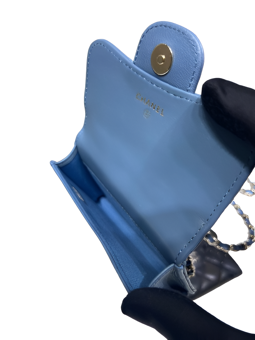 CHANEL Quilted Blue Mini Flap Bag