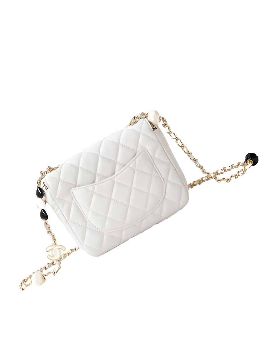 CHANEL Quilted White Classic Flap Bag