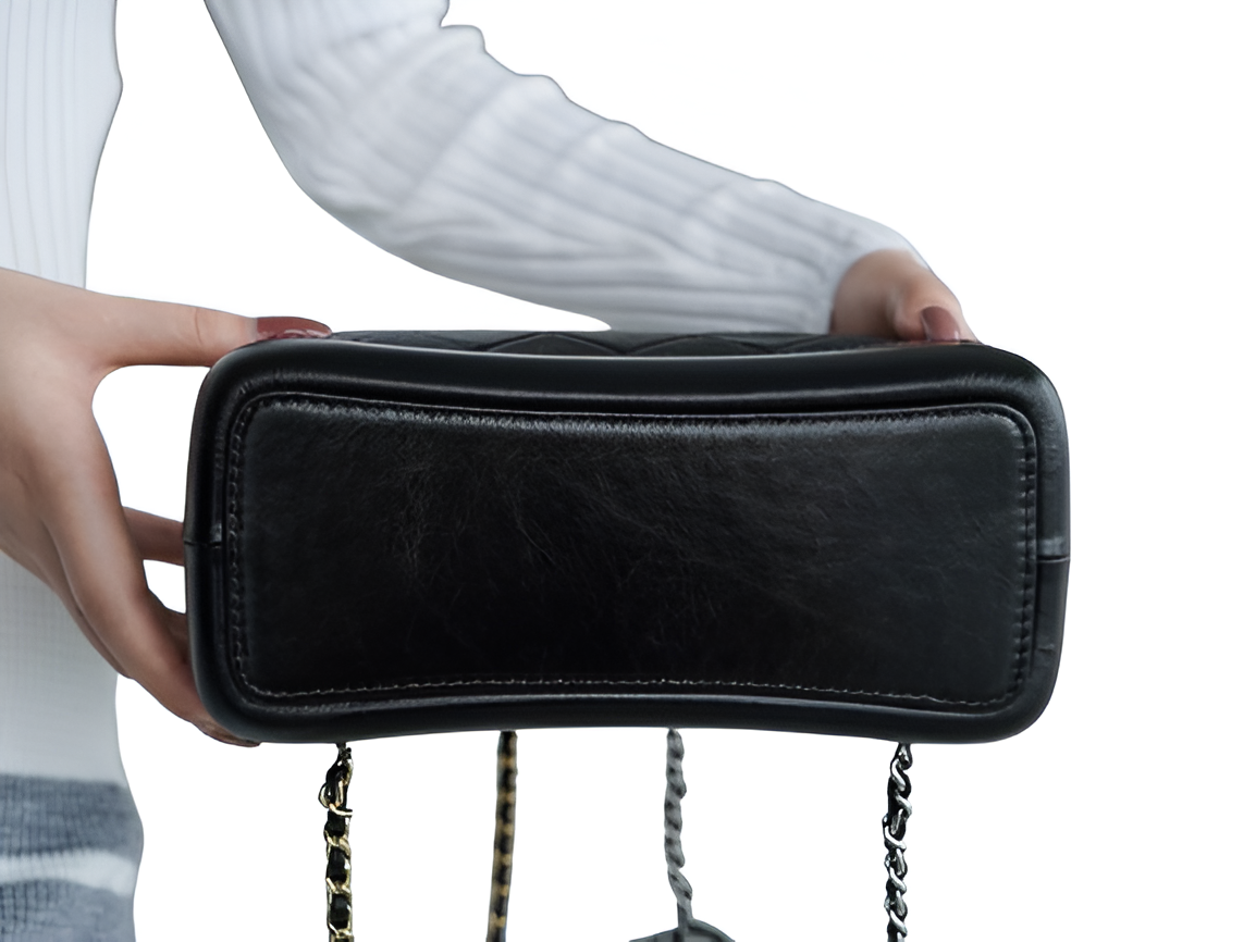 CHANEL Quilted Black Drawstring Backpack