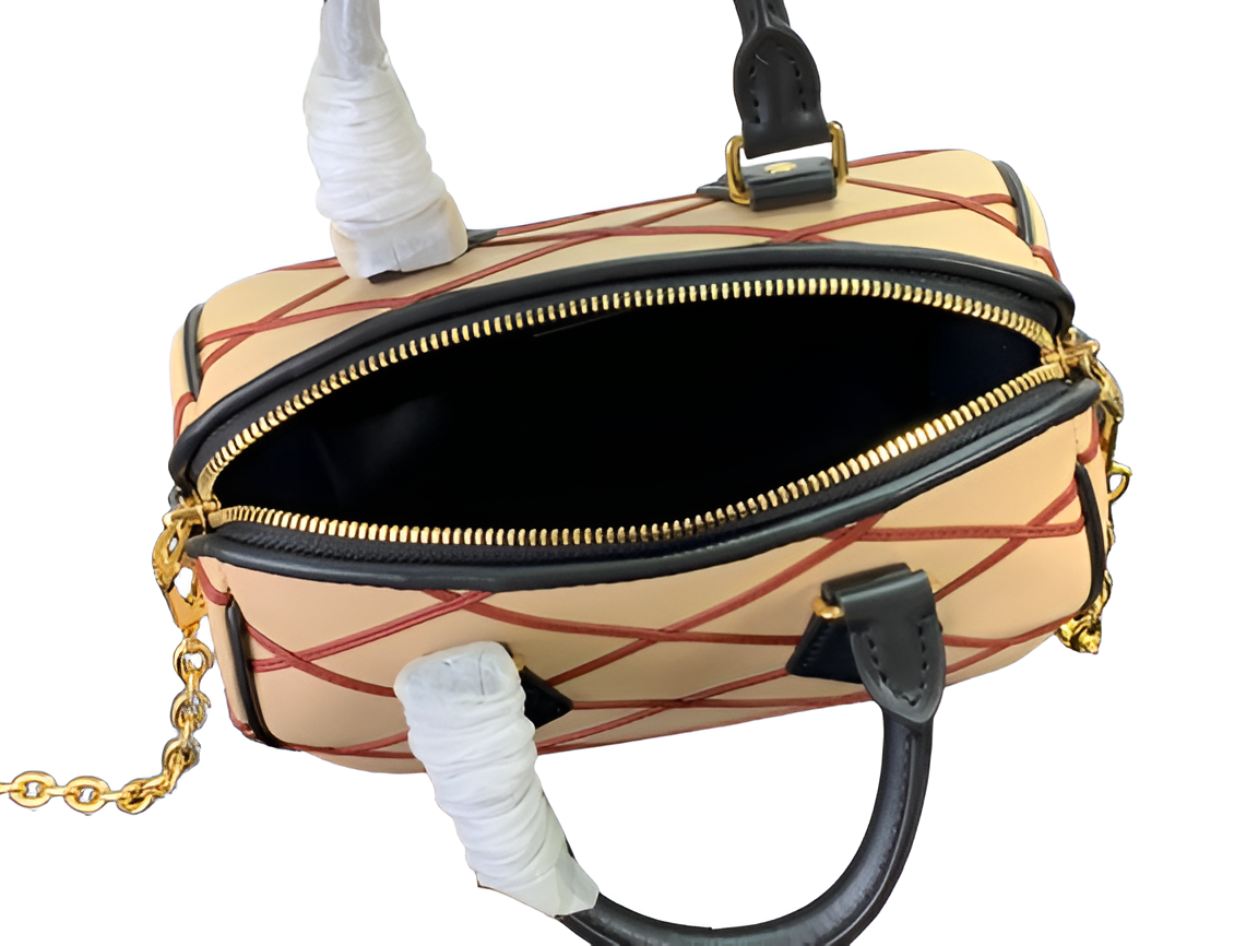 Louis Vuitton-inspired beige and red quilted handbag