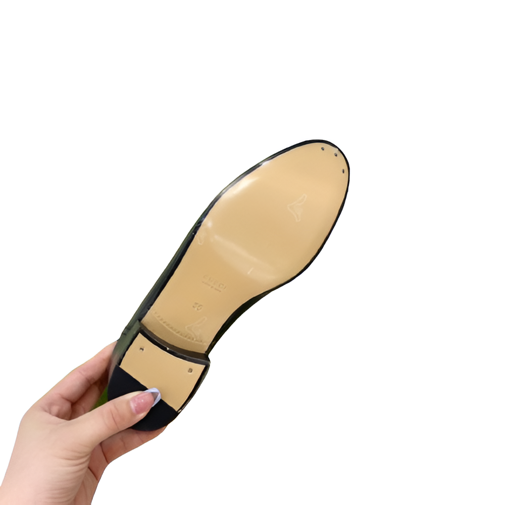 Gucci Women's Black Loafers with Gold Chain Detail