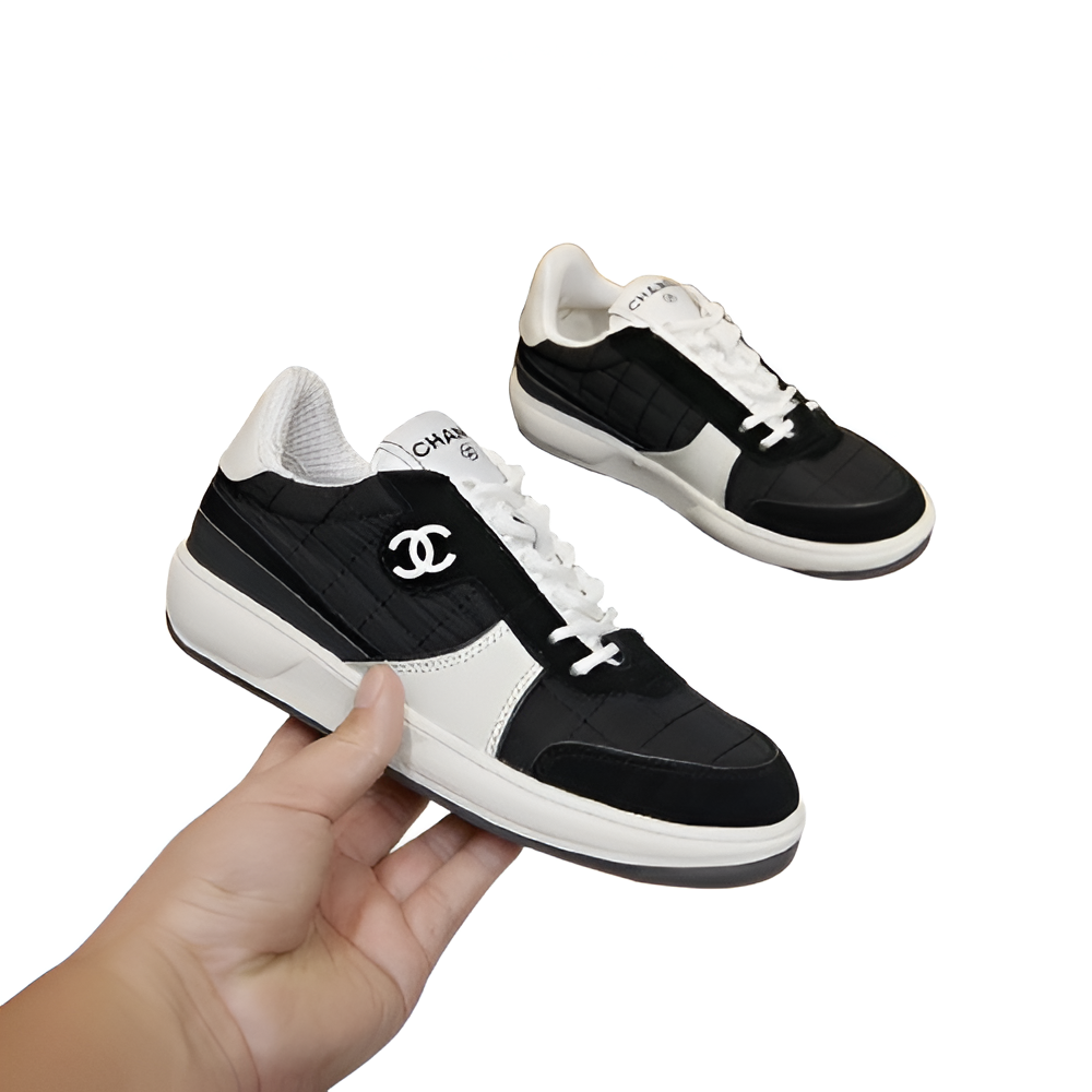 CHANEL Women's Black & White Sneakers