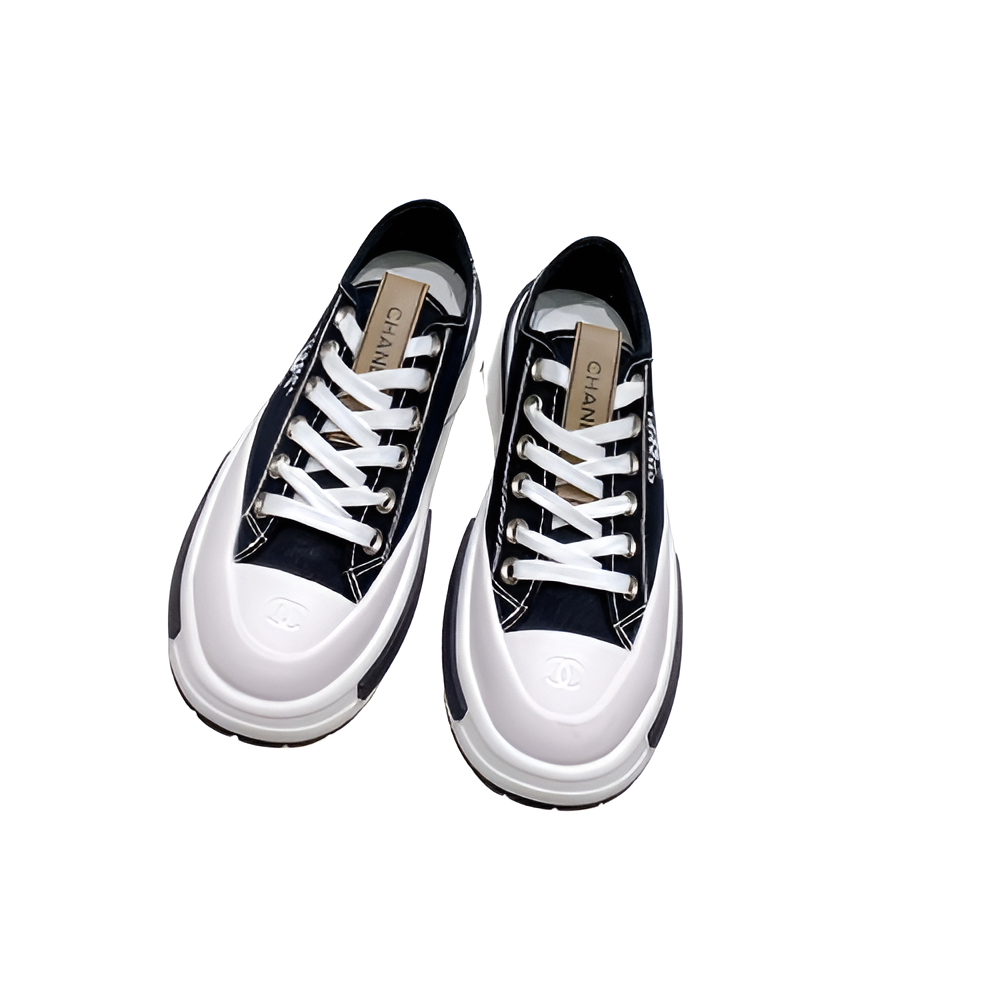 CHANEL Women's Navy & White Sneakers