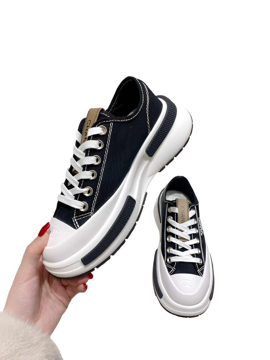 CHANEL Women's Navy & White Sneakers