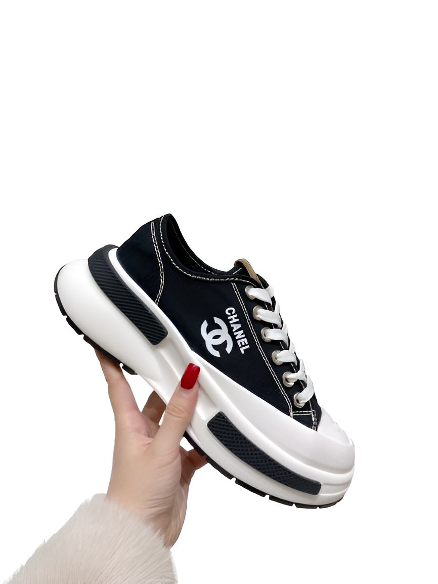 CHANEL Women's Navy & White Sneakers