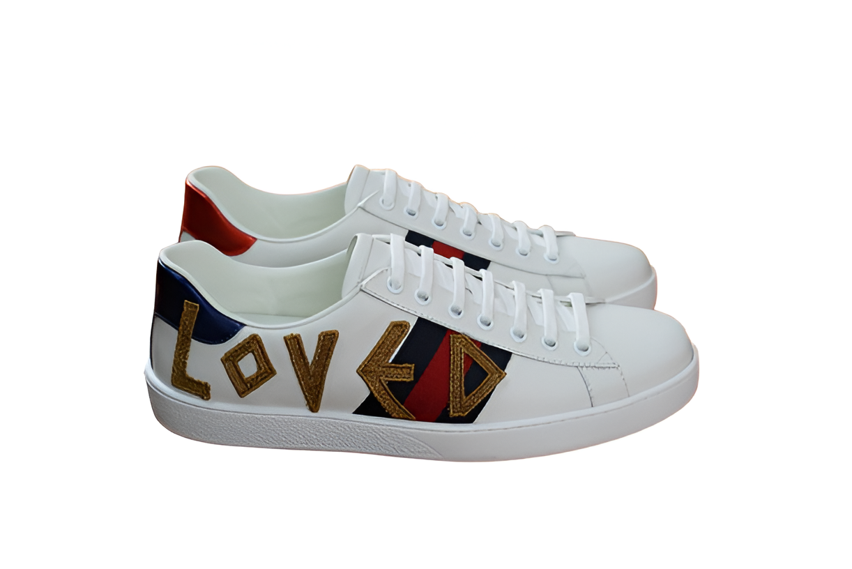 GUCCI Men's White Leather Sneakers with Gold Detail and Web Stripe
