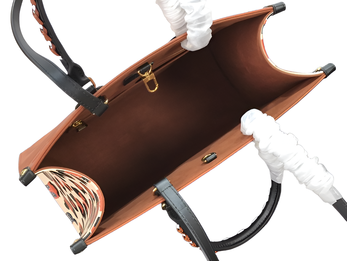 Louis Vuitton brown embossed tote bag