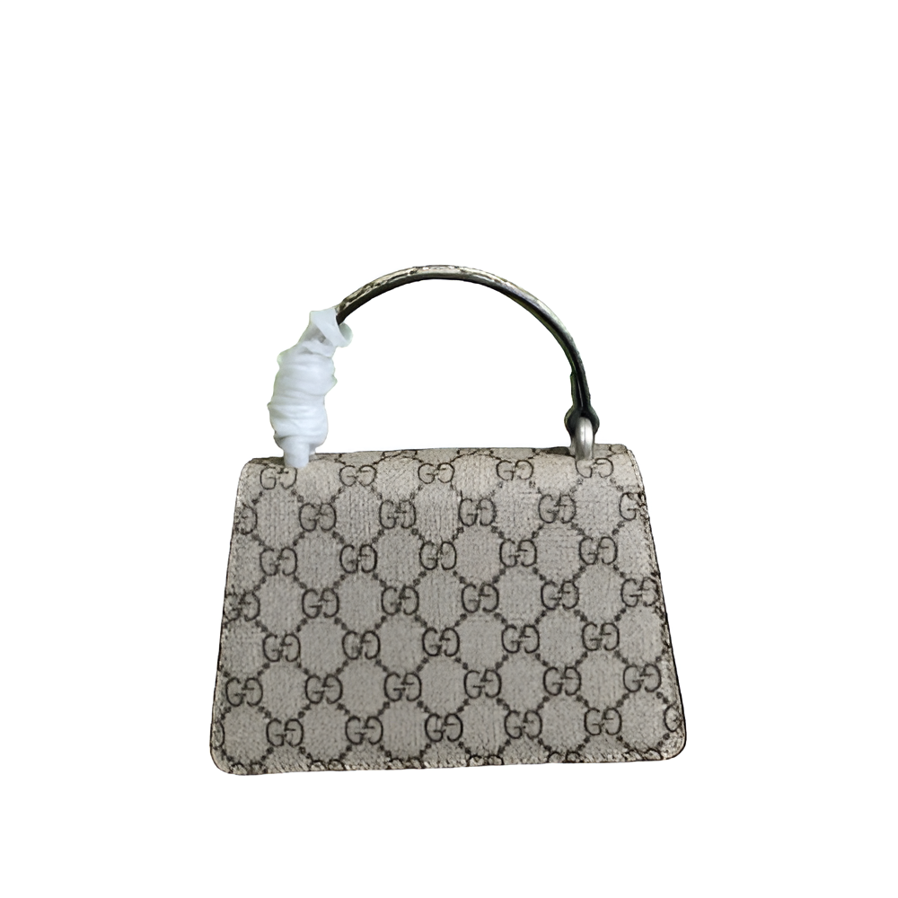 GUCCI Mini Dionysus bag features the classic GG Supreme canvas