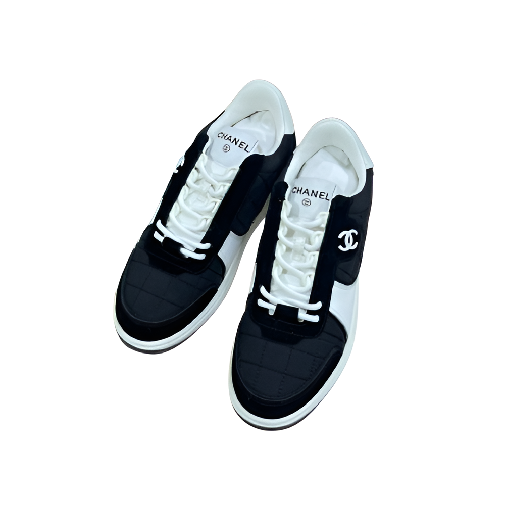 CHANEL Men's Quilted Black & White Sneakers