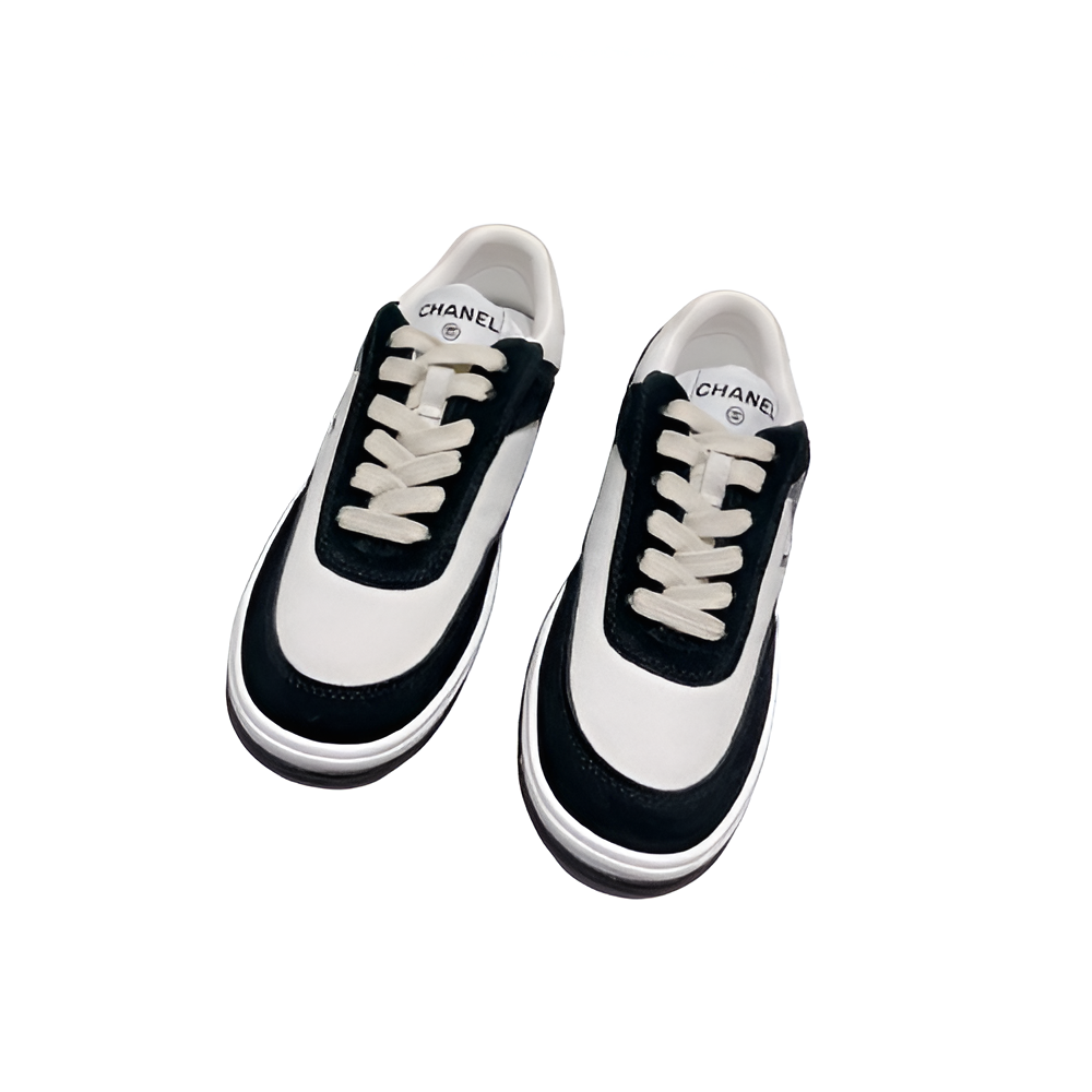 CHANEL Women's Black & White Sneakers